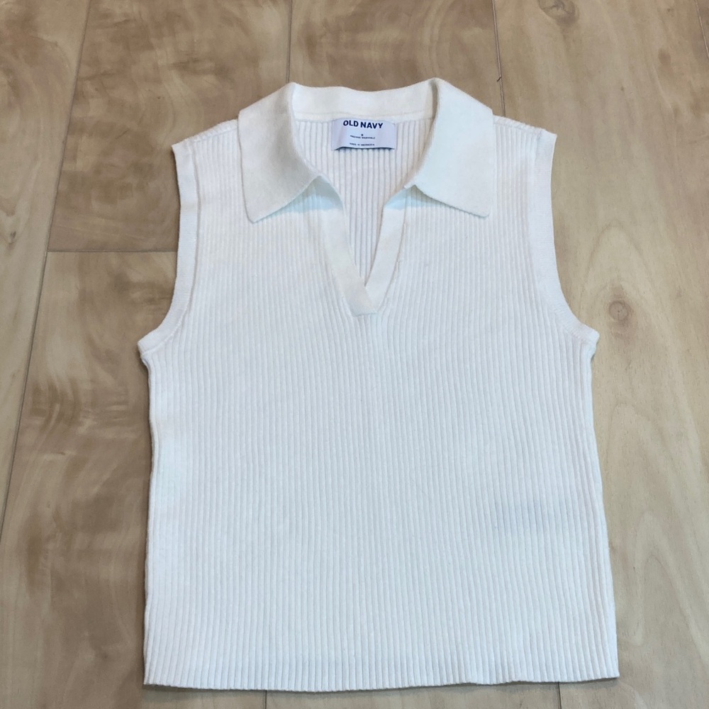 Sleeveless knit polo